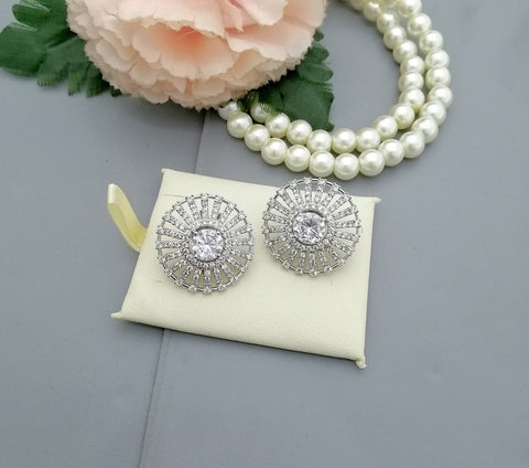 Diamond cut round earrings